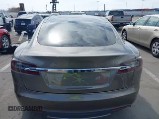 2015 Tesla Model S 85 with VIN 5YJSA1E14FF120455, listed as a IAAI auction lot 42053306 with 62,817 mi miles and . Bid and sale history available at DreamBid. Image 16.
