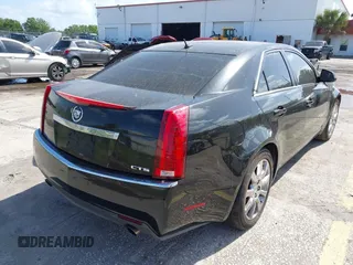 2008 Cadillac CTS RWD w/1SA with VIN 1G6DJ577180141687, listed as a IAAI auction lot 41999393 with 323,361 mi miles. Bid and sale history available at carsss.com. Image 4.