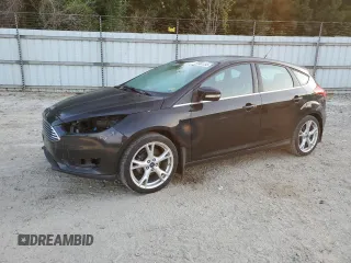 2015 Ford Focus Titanium z VIN 1FADP3N23FL346078, wystawiony jako Copart lot #61991195 z przebiegiem 188 014 mil mil oraz Szkoda całkowita • Salvage title. Historia ofert i sprzedaży dostępna na DreamBid. Obrazek 1.