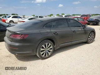 2020 Volkswagen Arteon SE z VIN WVWAR7AN7LE013526, wystawiony jako Copart lot #52791425 z przebiegiem 28 480 mil mil oraz Czysty tytuł • Clean title. Historia ofert i sprzedaży dostępna na DreamBid. Obrazek 3.