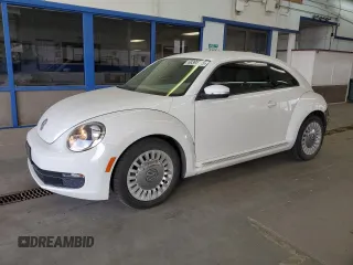 2014 Volkswagen Beetle 2.5L with VIN 3VWJP7AT7EM609170, listed as a Copart auction lot 60395115 with 107,844 mi miles and Salvage title. Bid and sale history available at DreamBid. Image 1.