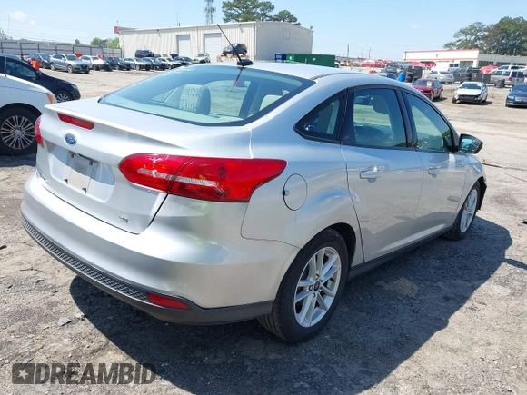 2017 Ford Focus SE with VIN 1FADP3F27HL240959, listed as a IAAI auction lot 41969507 with 75,743 mi miles and . Bid and sale history available at DreamBid. Image 4.