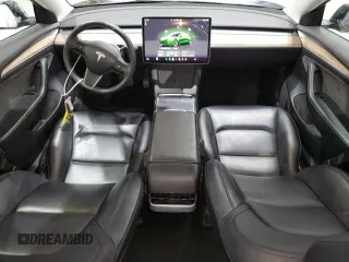 2023 Tesla Model 3 with VIN 5YJ3E1EA4PF452809, listed as a Copart auction lot 63688885 with 125,442 mi miles and Clean title. Bid and sale history available at DreamBid. Image 8.