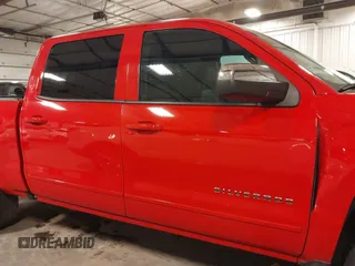 2017 Chevrolet Silverado 1500 LT with VIN 3GCUKREC9HG458520, listed as a IAAI auction lot 41364459 with 130,130 mi miles and . Bid and sale history available at DreamBid. Image 14.