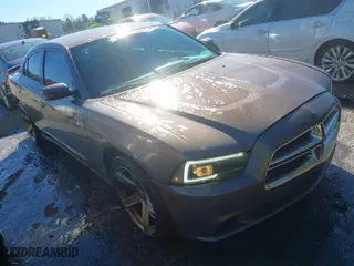 2013 Dodge Charger SE with VIN 2C3CDXBG2DH609438, listed as a IAAI auction lot 41649615 with 236,024 mi miles. Bid and sale history available at carsss.com. Image 1.
