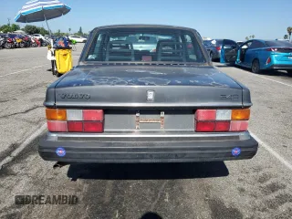 1993 Volvo 240 with VIN YV1AS8807P1483020, listed as a Copart auction lot 61060095 with 131,000 mi miles and Salvage title. Bid and sale history available at DreamBid. Image 6.