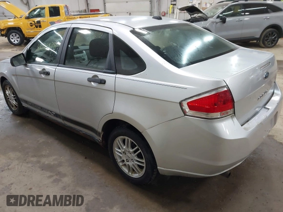 2011 Ford Focus SE with VIN 1FAHP3FN1BW120916, listed as a IAAI auction lot 42106878 with 107,166 mi miles. Bid and sale history available at carsss.com. Image 3.