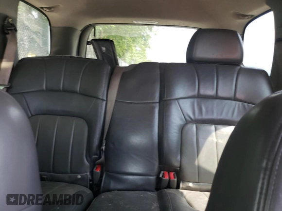 2004 GMC Envoy SLT with VIN 1GKDT13S042281050, listed as a Copart auction lot 60024304 with 267,205 mi miles and Salvage Title. Bid and sale history available at carsss.com. Image 10.