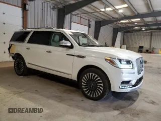2019 Lincoln Navigator Black Label z VIN 5LMJJ3TT4KEL19103, wystawiony jako Copart lot #61081284 z przebiegiem 58 418 mil mil oraz Szkoda całkowita • Salvage title. Historia ofert i sprzedaży dostępna na DreamBid. Obrazek 4.