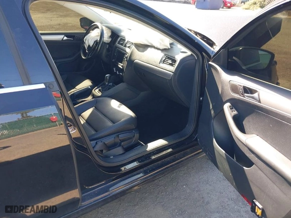 2016 Volkswagen Jetta Sedan 1.4T SE w/Connectivity with VIN 3VWD67AJ1GM369678, listed as a IAAI auction lot 41828693 with 110,964 mi miles. Bid and sale history available at carsss.com. Image 5.
