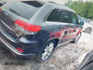 2015 Jeep Grand Cherokee Summit with VIN 1C4RJFJG0FC611768, listed as a IAAI auction lot 42468497 with 217,032 mi miles and . Bid and sale history available at DreamBid. Image 4.