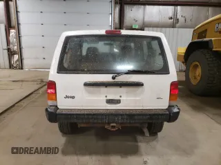 1998 Jeep Cherokee Sport with VIN 1J4FJ68S2WL239891, listed as a Copart auction lot 62966025 with 128,226 mi miles and Clean title. Bid and sale history available at DreamBid. Image 6.