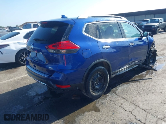 2017 Nissan Rogue SV with VIN KNMAT2MV9HP553763, listed as a IAAI auction lot 42380808 with 100,372 mi miles and . Bid and sale history available at DreamBid. Image 4.