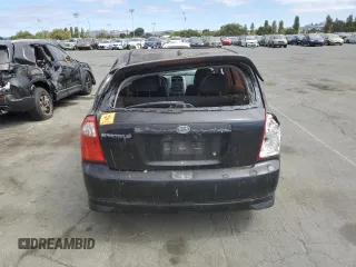 2005 Kia Spectra with VIN KNAFE162655074198, listed as a Copart auction lot 71015104 with 200,819 mi miles and Salvage Title. Bid and sale history available at DreamBid. Image 6.