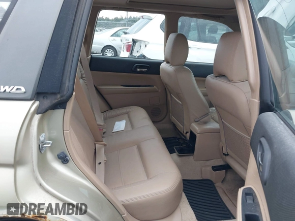 2003 Subaru Forester XS with VIN JF1SG65683H734188, listed as a IAAI auction lot 41584619 with 242,536 mi miles. Bid and sale history available at carsss.com. Image 8.