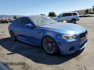 2016 BMW M5 with VIN WBSFV9C57GG343387, listed as a Copart auction lot 73416564 with 71,131 mi miles and Salvage Title. Bid and sale history available at carsss.com. Image 4.
