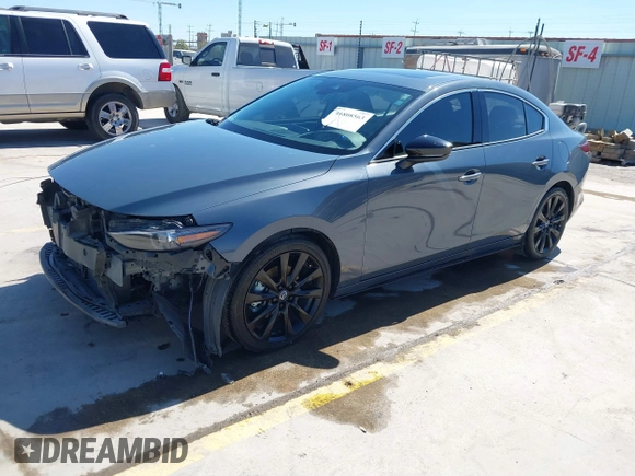 2022 Mazda 3 2.5 Turbo z VIN 3MZBPBAY8NM308426, wystawiony jako IAAI lot #41808563 z przebiegiem 44 693 mil mil oraz . Historia ofert i sprzedaży dostępna na DreamBid. Obrazek 18.