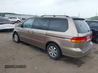 2003 Honda Odyssey EX-L z VIN 5FNRL18063B135949, wystawiony jako IAAI lot #42248105 z przebiegiem 210 567 mil mil oraz . Historia ofert i sprzedaży dostępna na DreamBid. Obrazek 3.