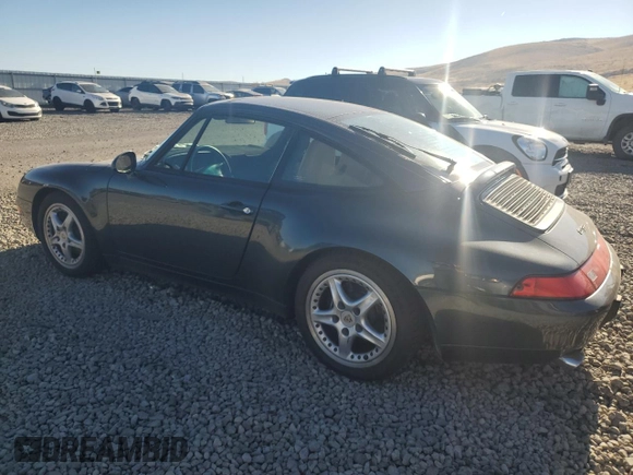 1996 Porsche 911 with VIN WP0DA2996TS385231, listed as a Copart auction lot 83699964 with 60,492 mi miles and Salvage title. Bid and sale history available at DreamBid. Image 2.