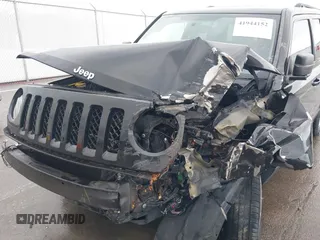 2014 Jeep Patriot Sport with VIN 1C4NJRBBXED879285, listed as a IAAI auction lot 41944152 with 103,676 mi miles. Bid and sale history available at carsss.com. Image 6.