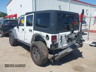 2014 Jeep Wrangler Unlimited Sport with VIN 1C4BJWDG1EL121190, listed as a IAAI auction lot 41913348 with 162,066 mi miles and . Bid and sale history available at DreamBid. Image 3.