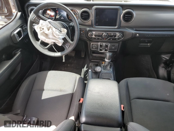 2023 Jeep Wrangler Willys with VIN 1C4HJXDG6PW663824, listed as a Copart auction lot 57761905 with 15,040 mi miles and Salvage title. Bid and sale history available at DreamBid. Image 8.