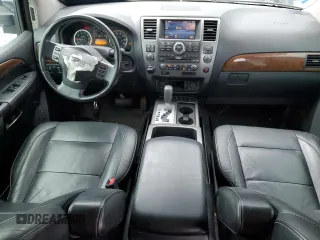 2012 Nissan Armada Platinum z VIN 5N1AA0NC4CN613049, wystawiony jako Copart lot #64414564 z przebiegiem 143 009 mil mil oraz Szkoda całkowita • Salvage title. Historia ofert i sprzedaży dostępna na DreamBid. Obrazek 8.