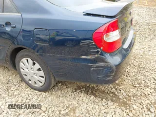 2003 Toyota Camry LE with VIN 4T1BE32K13U241259, listed as a IAAI auction lot 41907480 with 281,229 mi miles and . Bid and sale history available at DreamBid. Image 6.