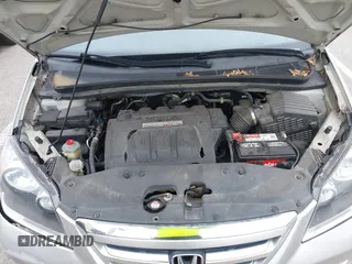 2007 Honda Odyssey Touring z VIN 5FNRL38877B091046, wystawiony jako IAAI lot #42187965 z przebiegiem Nie podano mil oraz . Historia ofert i sprzedaży dostępna na DreamBid. Obrazek 10.