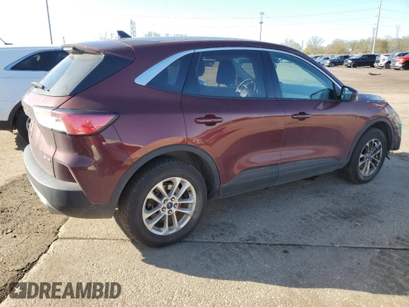 2021 Ford Escape SE with VIN 1FMCU9G67MUA94906, listed as a Copart auction lot 54310725 with 84,595 mi miles and Salvage title. Bid and sale history available at DreamBid. Image 3.