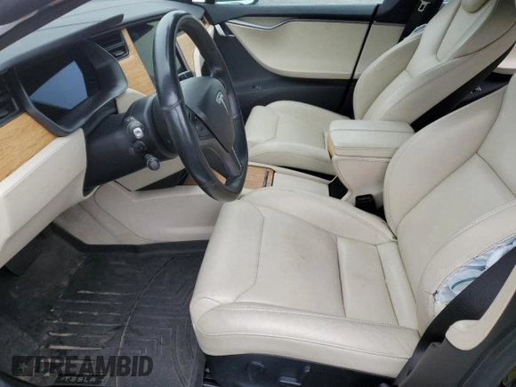2019 Tesla Model S 75D with VIN 5YJSA1E28KF349241, listed as a Copart auction lot 55279595 with 77,005 mi miles and Salvage title. Bid and sale history available at DreamBid. Image 7.