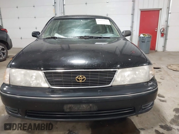 1998 Toyota Avalon XL with VIN 4T1BF18B5WU229340, listed as a IAAI auction lot 41957632 with 212,657 mi miles and . Bid and sale history available at DreamBid. Image 12.
