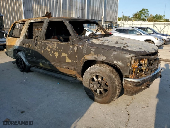 1997 Chevrolet Tahoe with VIN 1GNEK13RXVJ429428, listed as a Copart auction lot 70564004 with 0 mi miles and Non Repairable. Bid and sale history available at carsss.com. Image 4.
