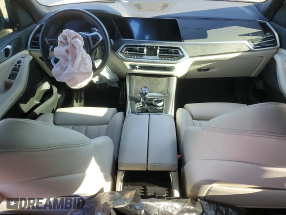 2022 BMW X5 sDrive40i with VIN 5UXCR4C02N9J39621, listed as a Copart auction lot 87696995 with 0 mi miles and Salvage Title. Bid and sale history available at carsss.com. Image 8.