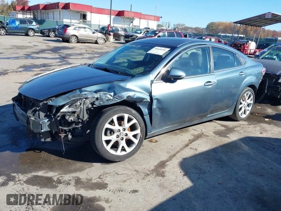 2013 Mazda 6 i Touring Plus z VIN 1YVHZ8EH8D5M15043, wystawiony jako IAAI lot #38068204 z przebiegiem 217 806 mil mil oraz . Historia ofert i sprzedaży dostępna na DreamBid. Obrazek 17.