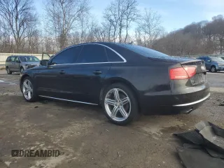 2013 Audi A8 3.0L with VIN WAUAGAFDXDN000657, listed as a Copart auction lot 42992755 with 154,426 mi miles and Salvage title. Bid and sale history available at DreamBid. Image 2.