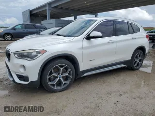 2016 BMW X1 xDrive28i with VIN WBXHT3C34GP887401, listed as a Copart auction lot 52255655 with 129,599 mi miles and Clean Title. Bid and sale history available at carsss.com. Image 1.