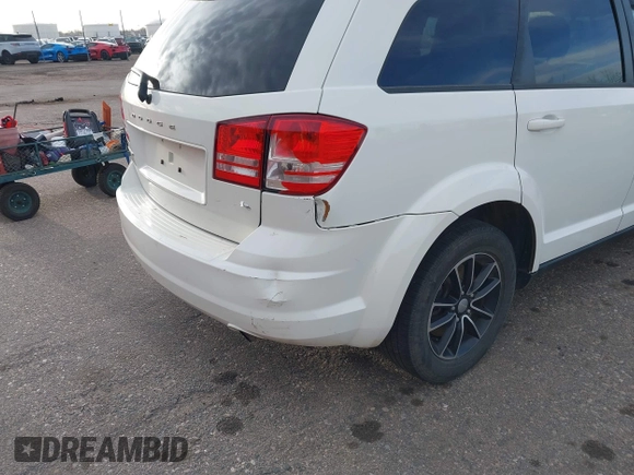 2017 Dodge Journey SE with VIN 3C4PDCAB6HT670624, listed as a IAAI auction lot 41777947 with 143,496 mi miles and . Bid and sale history available at DreamBid. Image 6.