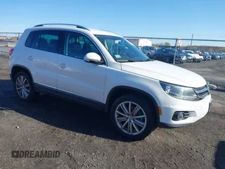 2013 Volkswagen Tiguan SE with VIN WVGBV7AX7DW511699, listed as a IAAI auction lot 41970908 with 164,758 mi miles and . Bid and sale history available at DreamBid. Image 1.