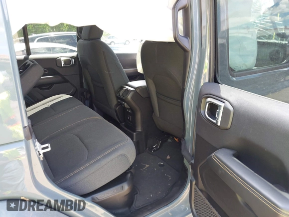 2024 Jeep Wrangler Sahara with VIN 1C4RJXP68RW270112, listed as a IAAI auction lot 42193921 with 23,792 mi miles and . Bid and sale history available at DreamBid. Image 8.