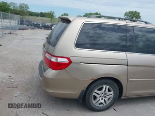 2005 Honda Odyssey EX with VIN 5FNRL38475B029026, listed as a IAAI auction lot 42489079 with 156,075 mi miles and . Bid and sale history available at DreamBid. Image 16.