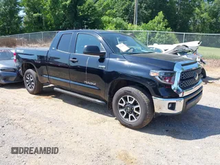 2021 Toyota Tundra SR with VIN 5TFUY5F16MX010746, listed as a IAAI auction lot 42547203 with 54,313 mi miles and . Bid and sale history available at DreamBid. Image 1.