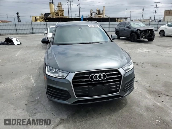 2018 Audi Q3 Premium with VIN WA1ECCFS8JR002738, listed as a Copart auction lot 53276095 with 171,912 mi miles and Salvage title. Bid and sale history available at DreamBid. Image 14.
