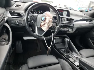 2018 BMW X2 sDrive28i with VIN WBXYJ3C39JEJ82814, listed as a Copart auction lot 59498615 with 74,550 mi miles and Salvage title. Bid and sale history available at DreamBid. Image 8.