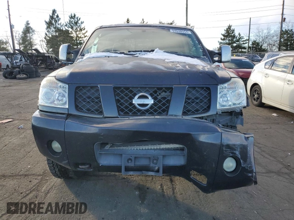 2004 Nissan Titan LE z VIN 1N6AA07B54N521567, wystawiony jako Copart lot #84048554 z przebiegiem 194 997 mil mil oraz Nie do naprawy • Non repairable. Historia ofert i sprzedaży dostępna na DreamBid. Obrazek 5.