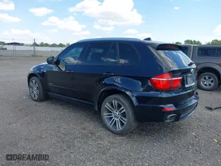 2011 BMW X5 35i with VIN 5UXZV4C53BL743050, listed as a IAAI auction lot 40074369 with 118,970 mi miles. Bid and sale history available at carsss.com. Image 3.