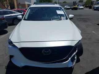 2023 Mazda CX-9 Touring Plus with VIN JM3TCBAY7P0636047, listed as a IAAI auction lot 42309618 with 20,821 mi miles and . Bid and sale history available at DreamBid. Image 12.