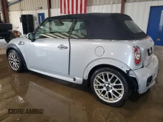 2013 MINI Convertible S z VIN WMWZP3C50DT550943, wystawiony jako Copart lot #62070255 z przebiegiem 63 122 mil mil oraz Szkoda całkowita • Salvage title. Historia ofert i sprzedaży dostępna na DreamBid. Obrazek 2.