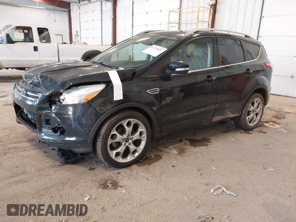 2016 Ford Escape Titanium with VIN 1FMCU0JX3GUB70607, listed as a IAAI auction lot 41727421 with 106,857 mi miles. Bid and sale history available at carsss.com. Image 19.