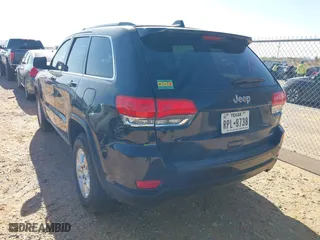 2014 Jeep Grand Cherokee Laredo with VIN 1C4RJEAG1EC348070, listed as a IAAI auction lot 41950898 with 129,883 mi miles. Bid and sale history available at carsss.com. Image 3.